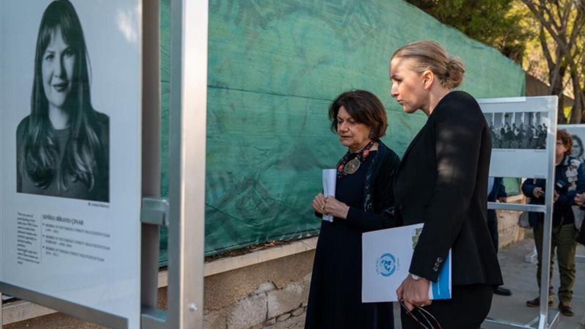 USG DiCarlo views an exhibit.