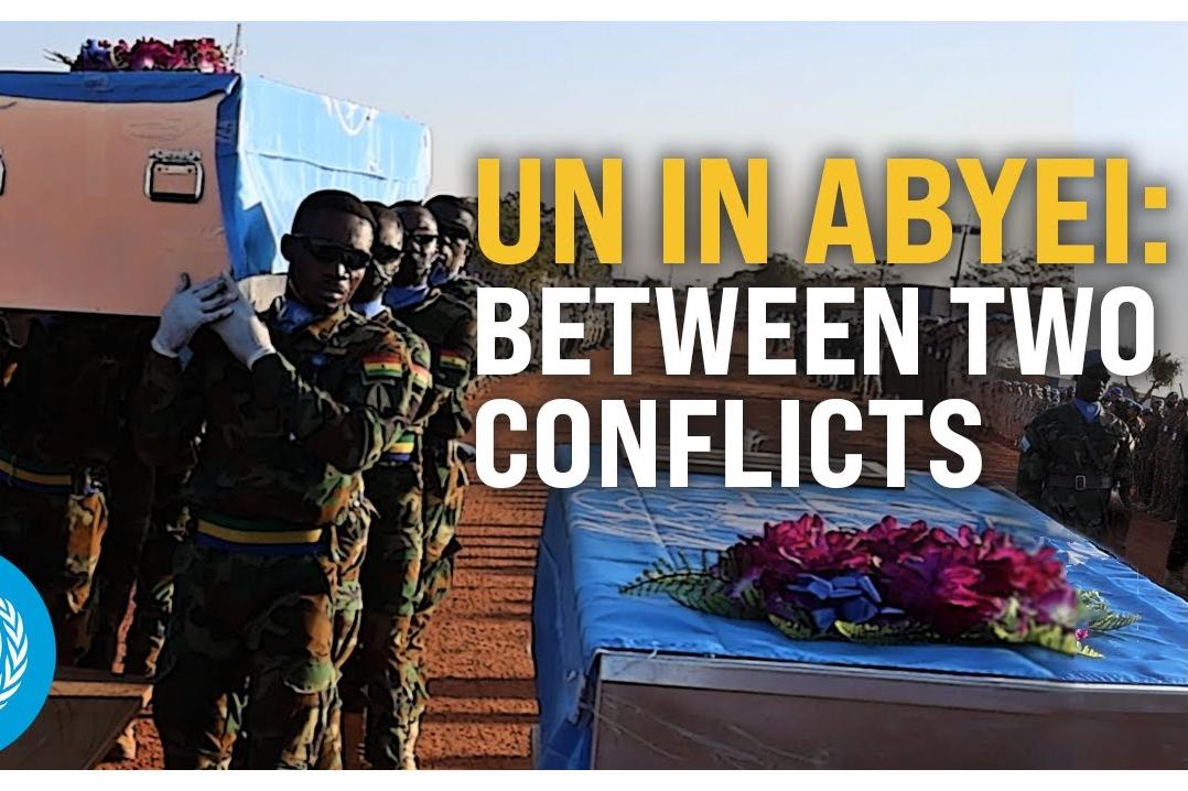Peacekeepers carrying a coffin. 